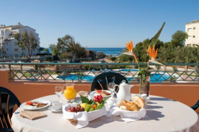 Отель Marbella Beach Resort at Club Playa Real  Марбелья